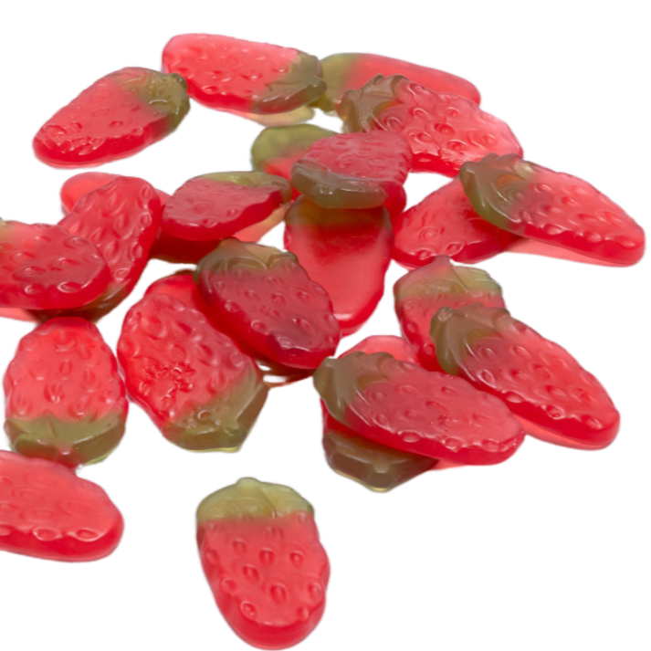 Grote aardbeivormige snoepjes in rood met groene bovenkant